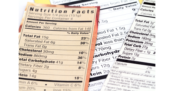 Multiple food product nutrition facts labels overlapping — understanding added sugar vs total sugar on food packaging